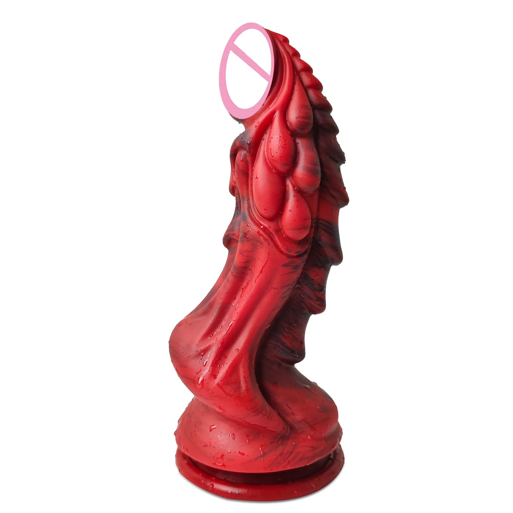 Red suction-cup dildo with ridged tentacle-like texture and water droplets, shown upright