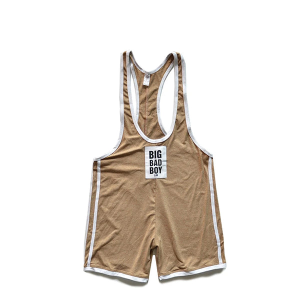 Front view of a tan wrestling singlet with white trim and a BIG BAD BOY chest patch