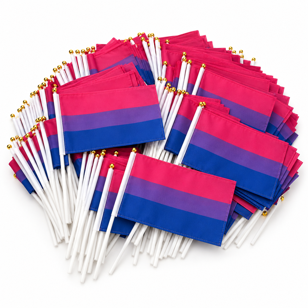 Bulk pile of small Bisexual Pride hand flags on a white background