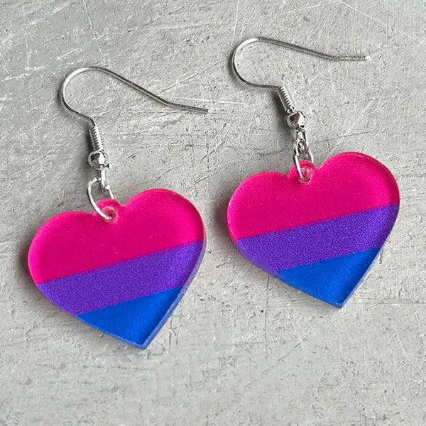 Pair of heart-shaped acrylic dangle earrings in pink, purple, and blue stripes