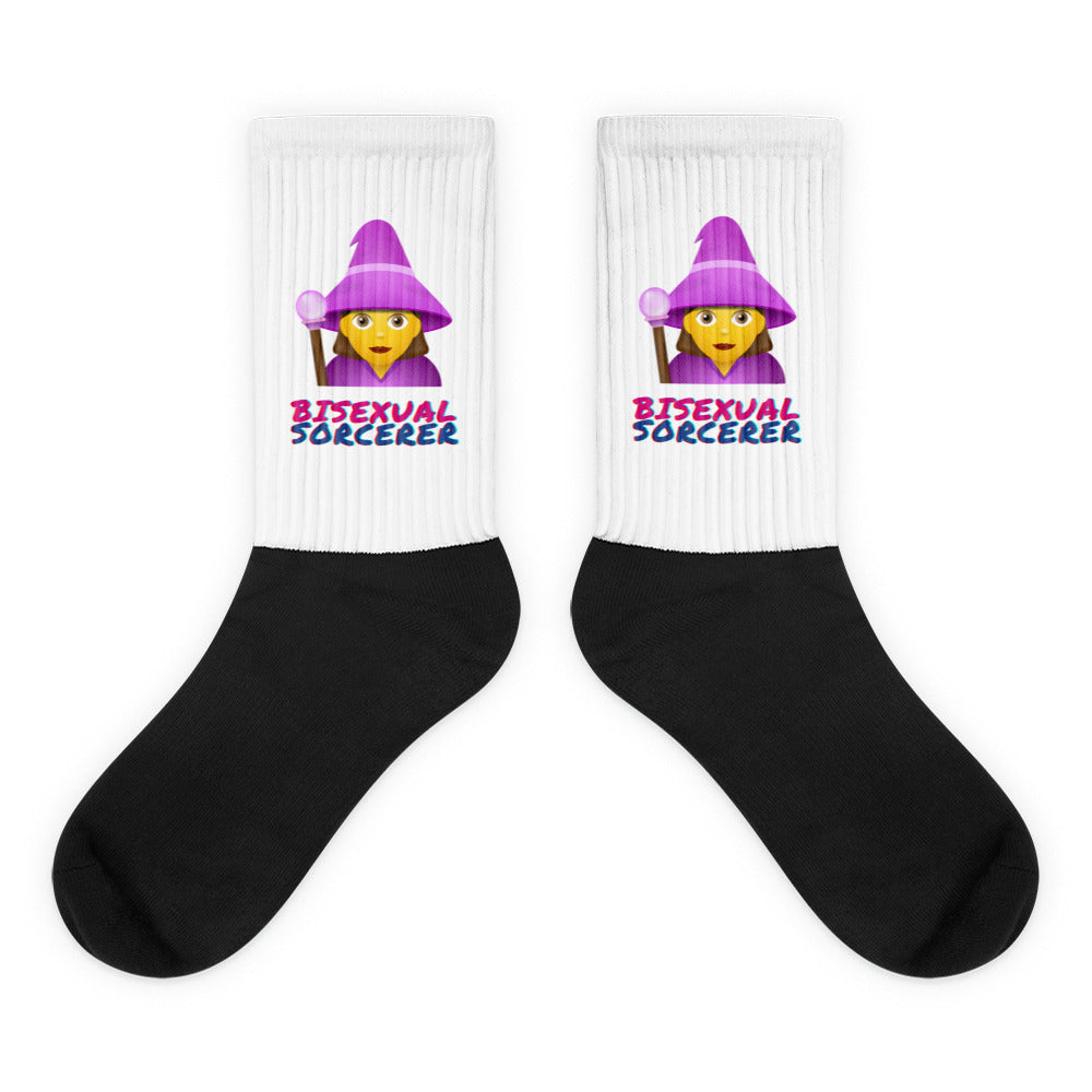 Pair of black-and-white socks with purple wizard graphics and “BISEXUAL SORCERER” text
