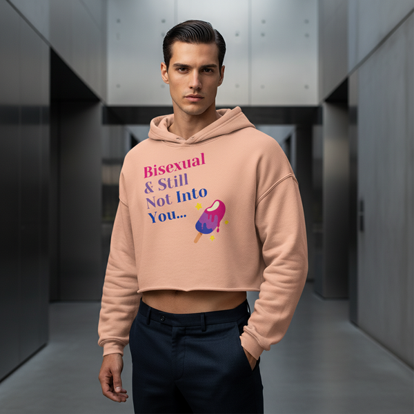 Bisexual & Still Not Into You Crop Hoodie in peach, melting pink popsicle graphic; worn by dark-haired person