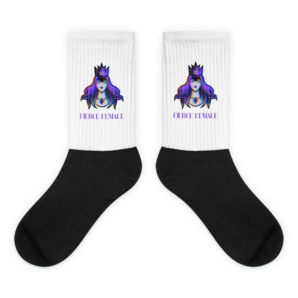 Pair of black-and-white crew socks with crowned woman graphics and “FIERCE FEMALE” text
