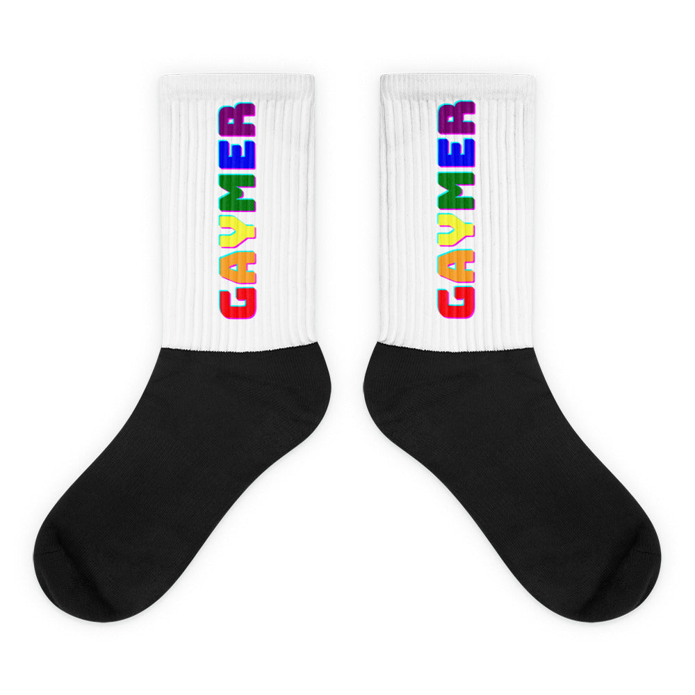 Pair of white-and-black ribbed socks with vertical rainbow “GAYMER” lettering