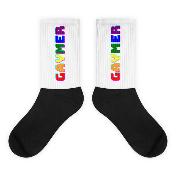 Pair of white-and-black ribbed socks with vertical rainbow “GAYMER” lettering