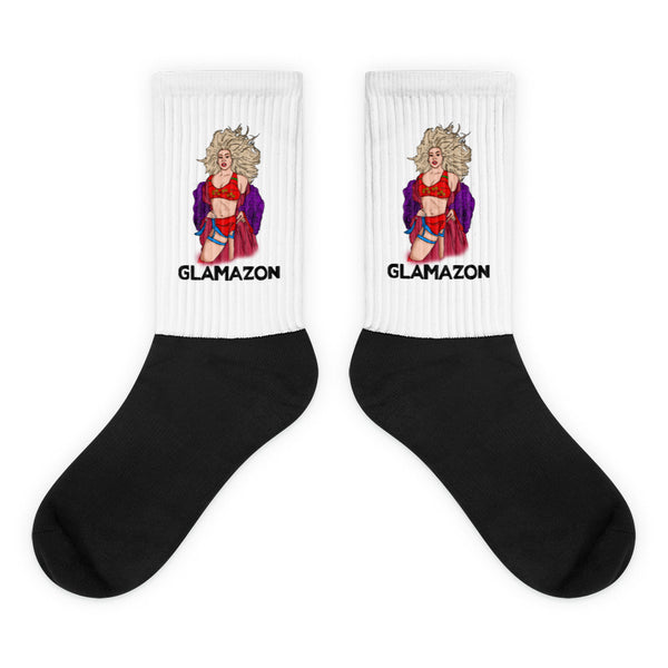 Pair of black-and-white socks with a glamorous pin-up illustration and “GLAMAZON” text