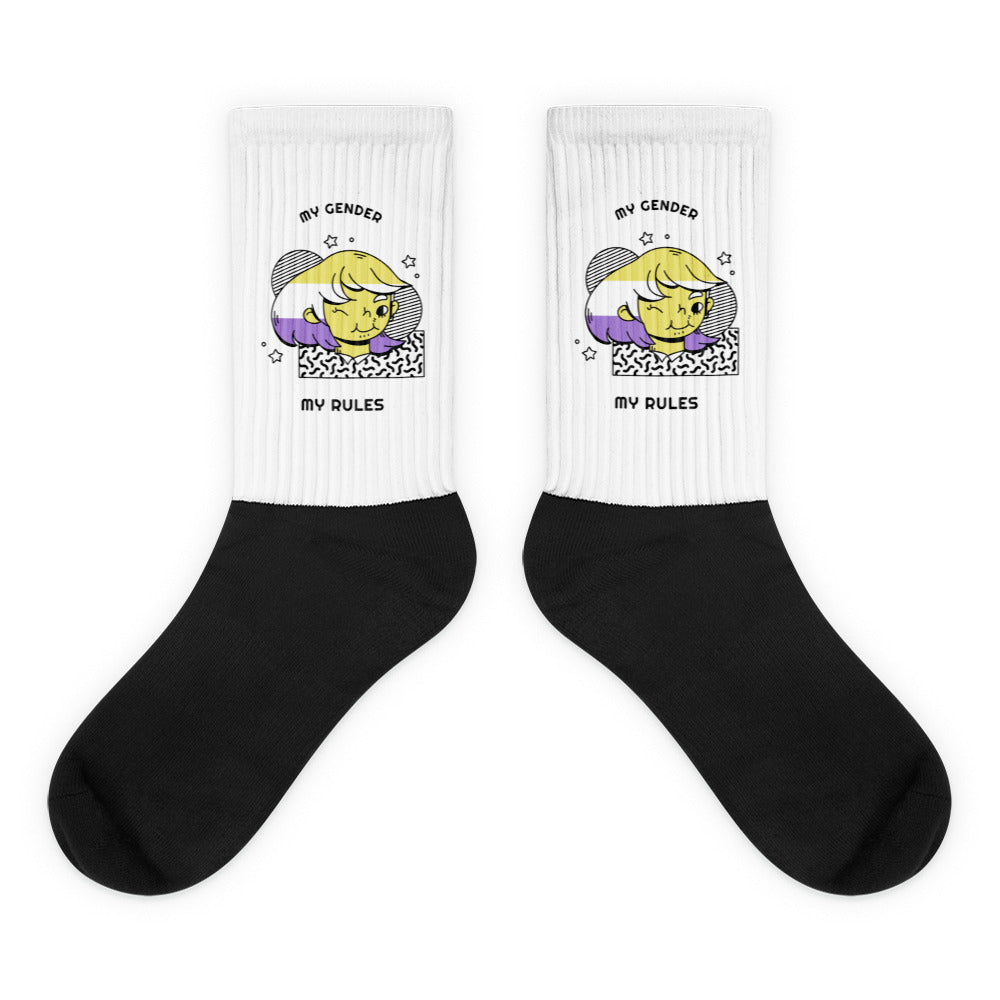 Pair of black-and-white crew socks reading “MY GENDER MY RULES” with a cartoon figure