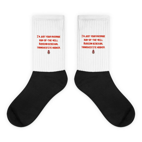 Crew-length Russian Bisexual Transvestite Hooker Socks feature black foot sections and white ribbed legs with bold red text and a matryoshka graphic, embodying queer pride, empowerment, and self-expression.