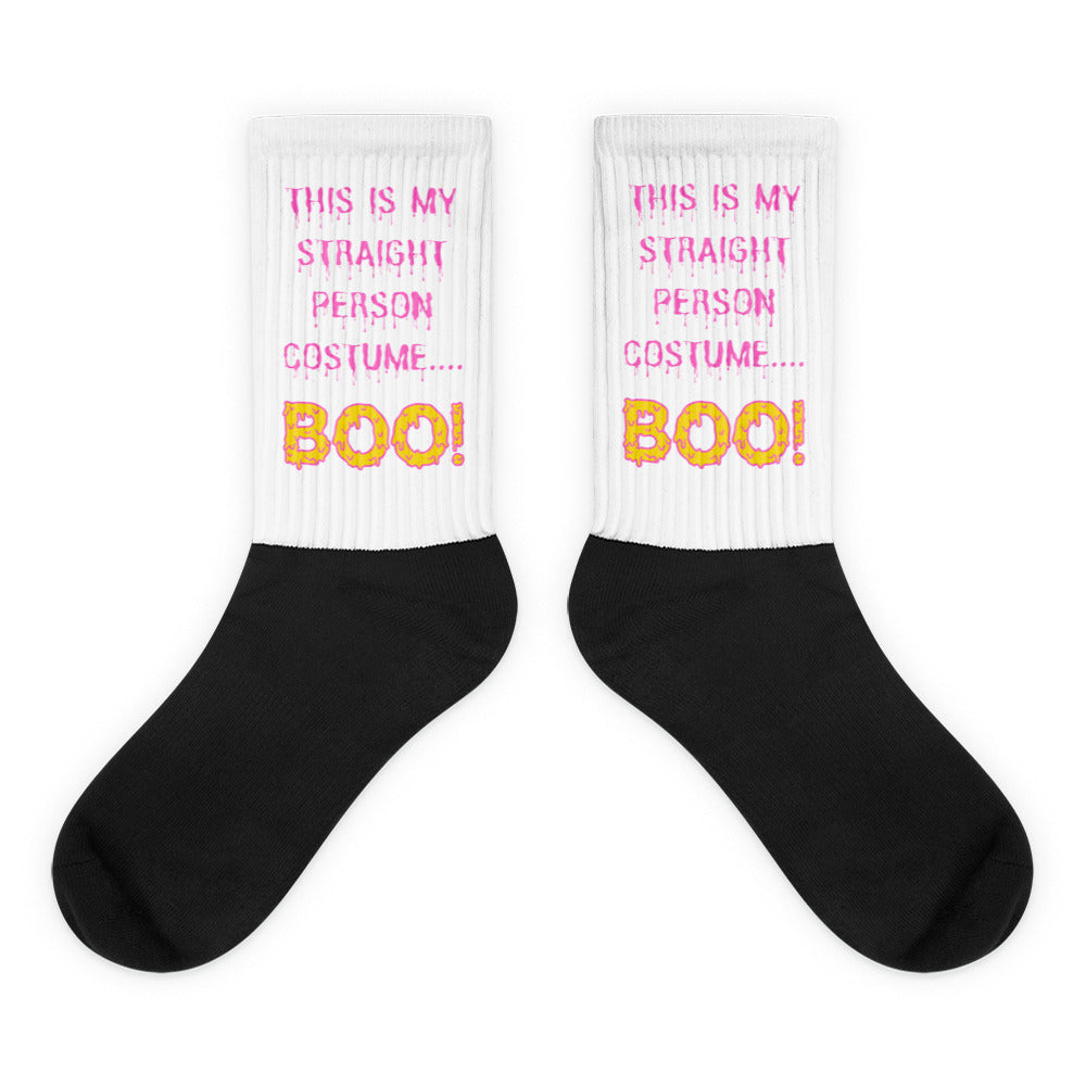 Pair of black-and-white socks reading “THIS IS MY STRAIGHT PERSON COSTUME.... BOO!”
