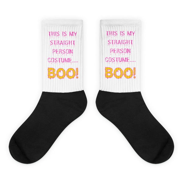 Pair of black-and-white socks reading “THIS IS MY STRAIGHT PERSON COSTUME.... BOO!”