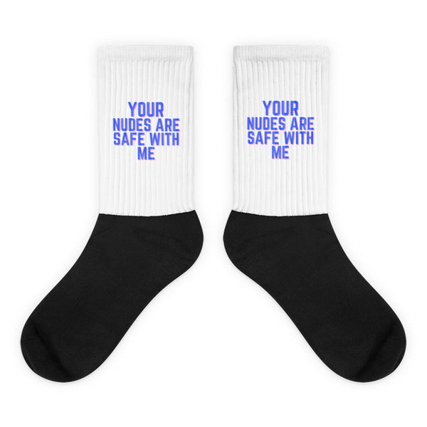Your Nudes Are Safe With Me Socks: Crew-length socks with a bold black foot and ribbed white calf featuring a cheeky blue statement, blending comfort with self-expression and queer pride.