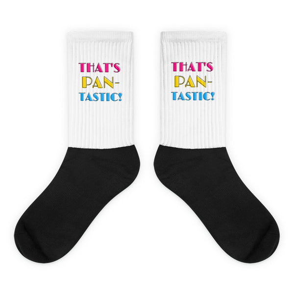 That's Pan-tastic! Socks feature a bold black foot and ribbed white leg with vibrant pink, yellow, and blue lettering, blending glamour and comfort in a playful, prideful statement of self-expression.