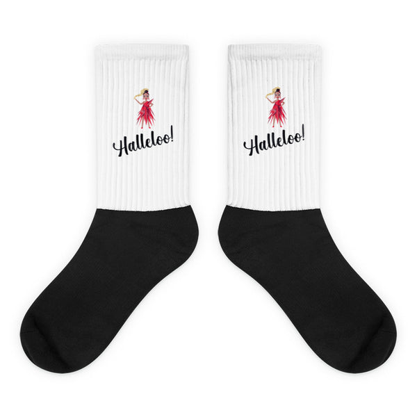 Halleloo! Socks feature a white ribbed upper with a vibrant illustration of a dancing woman in a red dress, and HallelOO! cursive text, transitioning to a sleek black foot section.