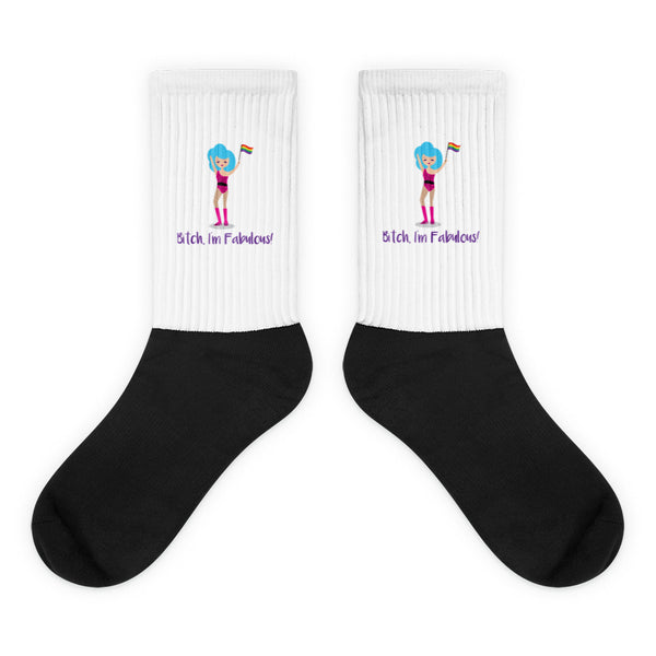 Bitch I'm Fabulous! Drag Queen Socks feature a blue-haired performer in pink boots, waving a rainbow Pride flag on a white background, embodying vibrant self-expression and queer empowerment with playful sass.