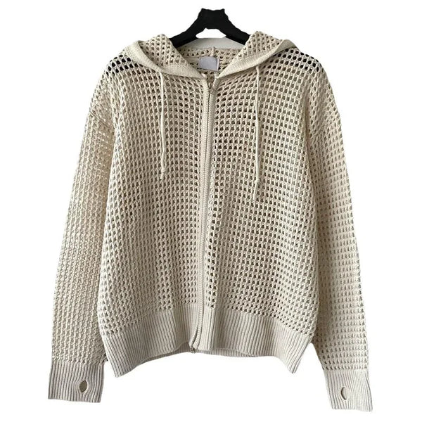 Model wearing beige open-weave mesh hooded sweatshirt with front zip and hood, close-up fashion view