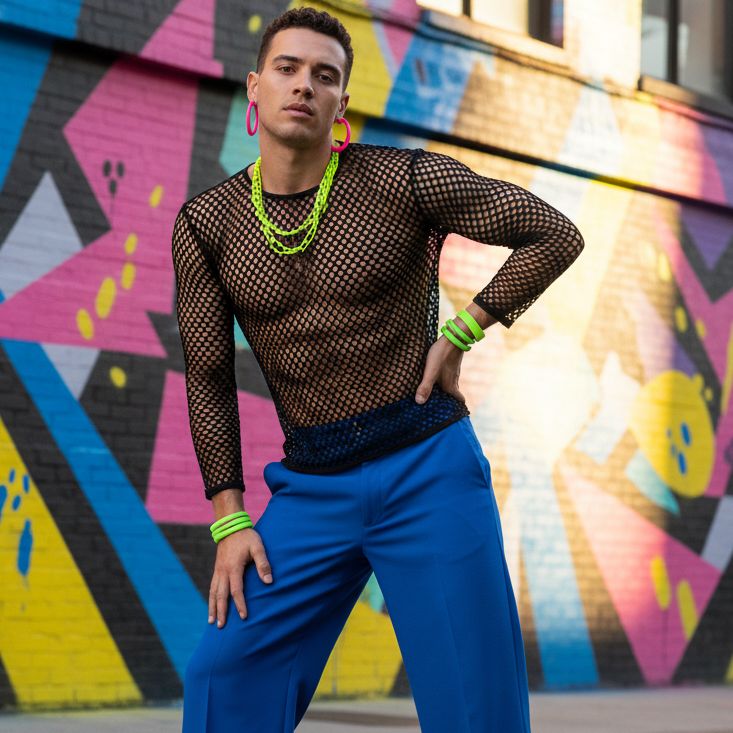 Model wearing a black see-through mesh long-sleeve shirt against a colorful mural