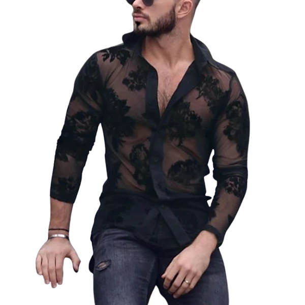 Bearded model wearing a black sheer floral-lace shirt with a dark collar and jeans