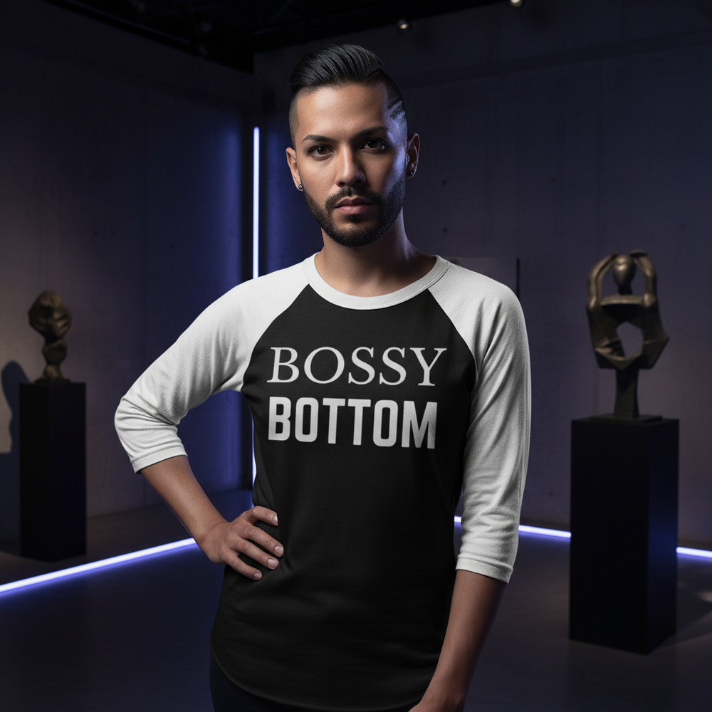 Bossy Bottom 3/4 Sleeve Raglan Shirt on a bearded person in a moody gallery