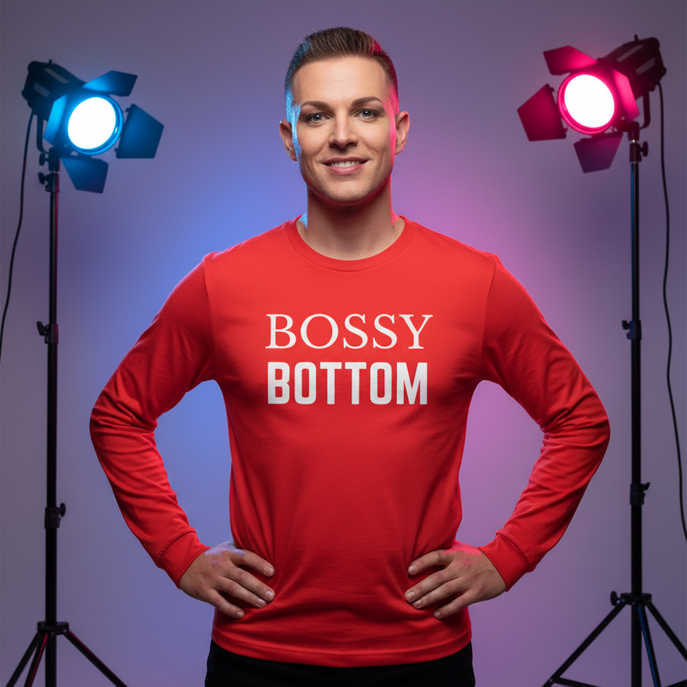 Bossy Bottom Unisex Long Sleeve T-Shirt in bold red, rocked by a smiling queer babe, hands on hips