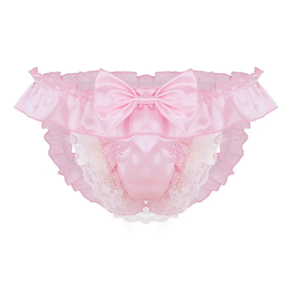 Front view of pink satin panties with a large bow, ruffles, and white lace panels