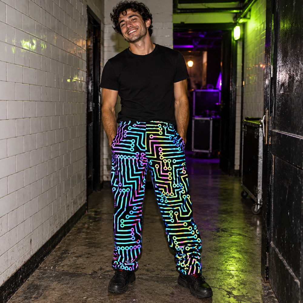 Fluorescent Circuit Reflective Festival Hoodie Jacket + Pants in Pants Only, styled at a white-tiled hallway behind an underground venue.