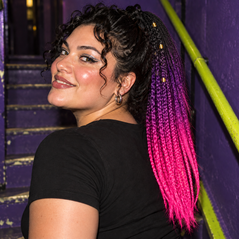 Neon Siren Cutout Rave Bodysuit in Fuchsia Hair Extension, styled at a violet-painted staircase with a narrow lime handrail.