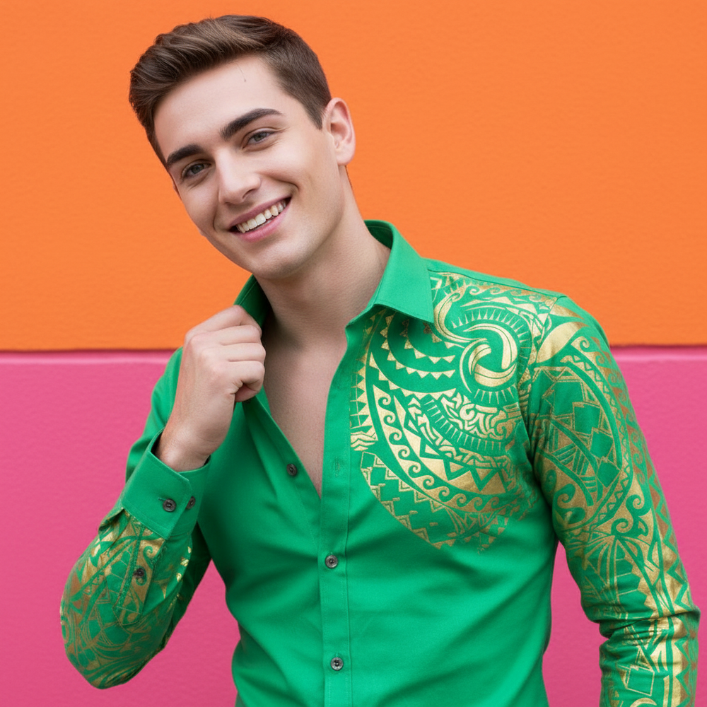 Smiling model in a green button-up shirt with ornate gold patterns