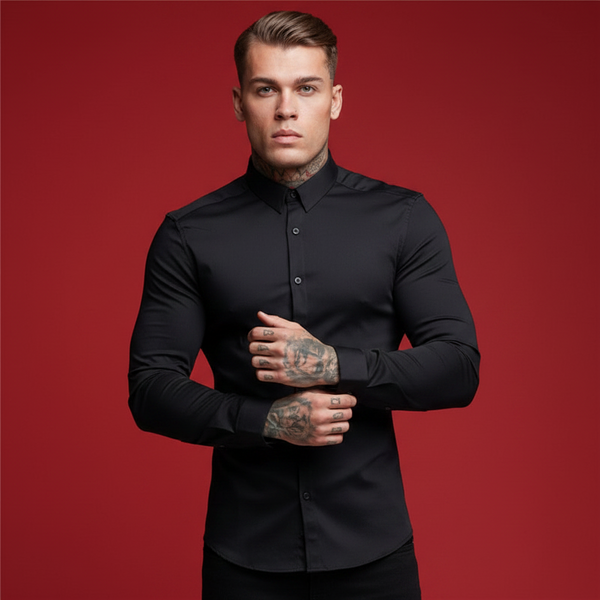 Front-facing model wearing a fitted black long-sleeve button-up shirt against a red background