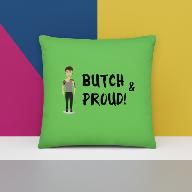 Green square LGBT pillow with “BUTCH & PROUD!” text, a tattooed short-haired figure, and bright blue, yellow, pink