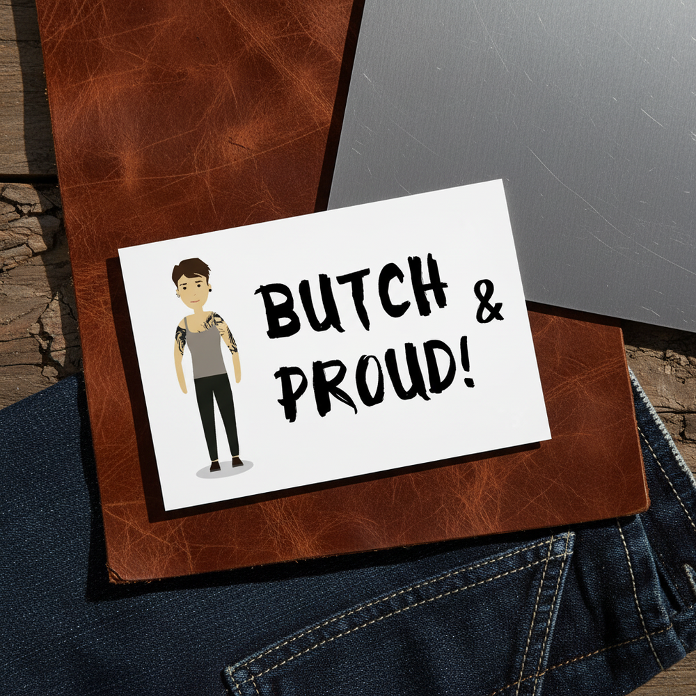 Butch & Proud postcard shows a tattooed cartoon figure in a tank top with bold “BUTCH & PROUD!” text