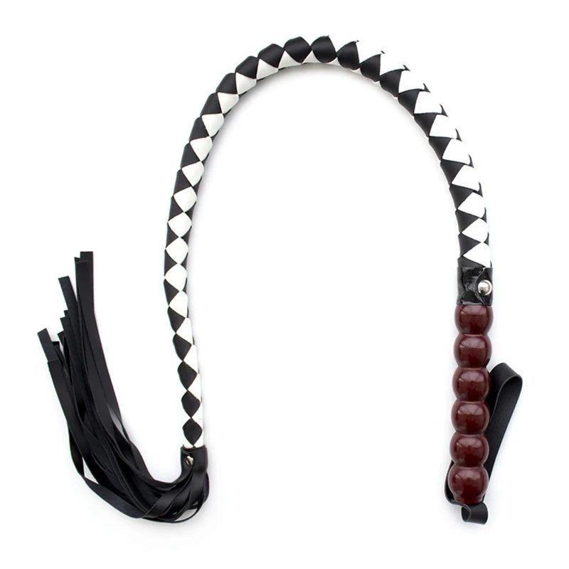 Black-and-white braided flogger with black falls and a red-brown beaded handle