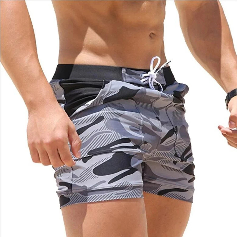 Camo pocket board shorts photographed for the product listing.