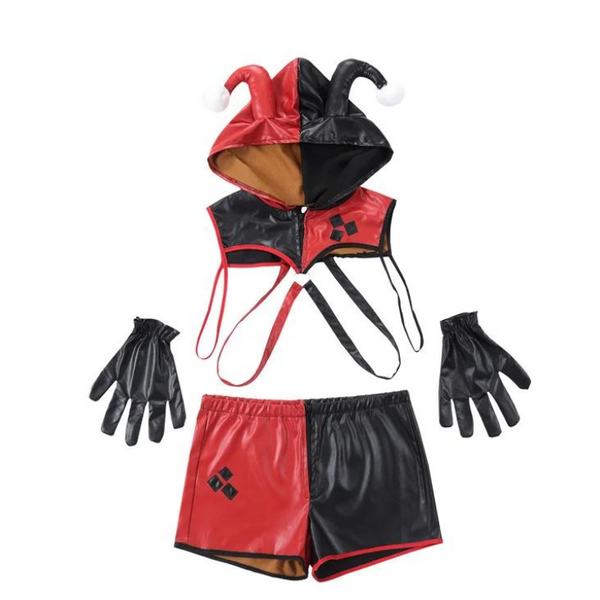 Flat lay of a red-and-black jester costume with hood, top, shorts, and gloves