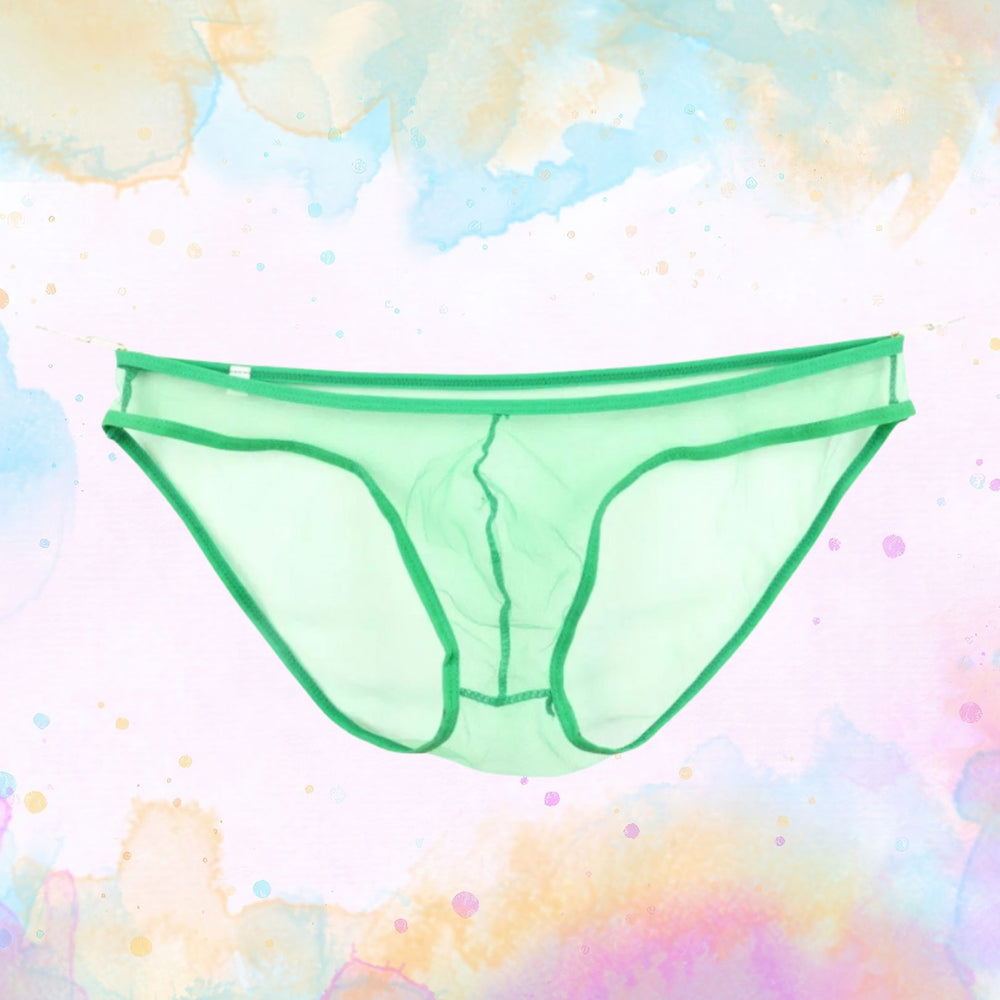 Front view of sheer green mesh men's briefs laid flat on a pastel splatter background