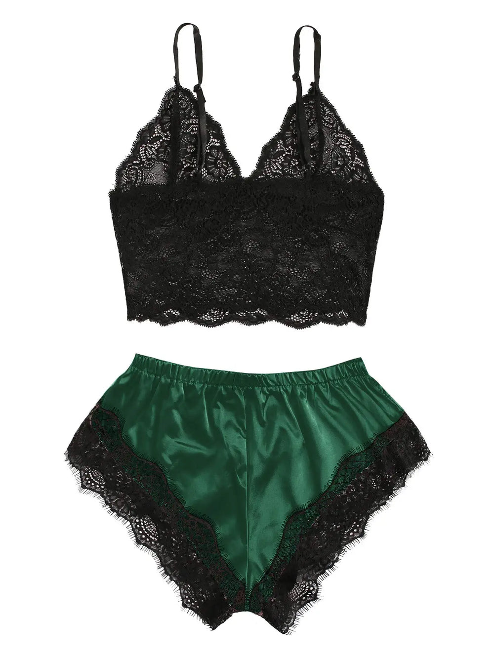 Flat lay of a black lace camisole and emerald green satin shorts with black lace trim