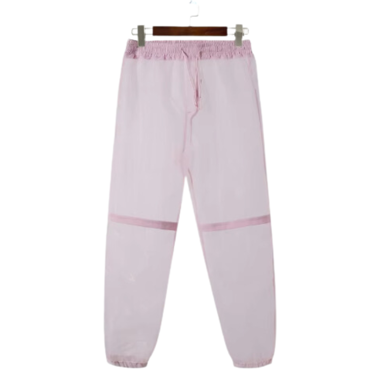 Light pink transparent runway pants with darker pink stripe bands, front view on a hanger