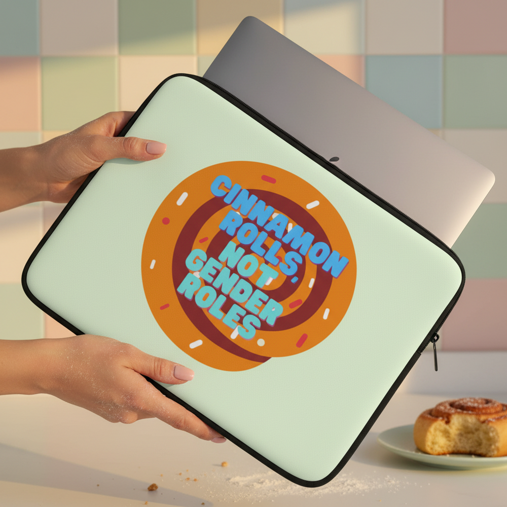 Cinnamon Rolls Not Gender Roles laptop sleeve in colorful design with rainbow-sprinkled cinnamon roll and bold blue slogan