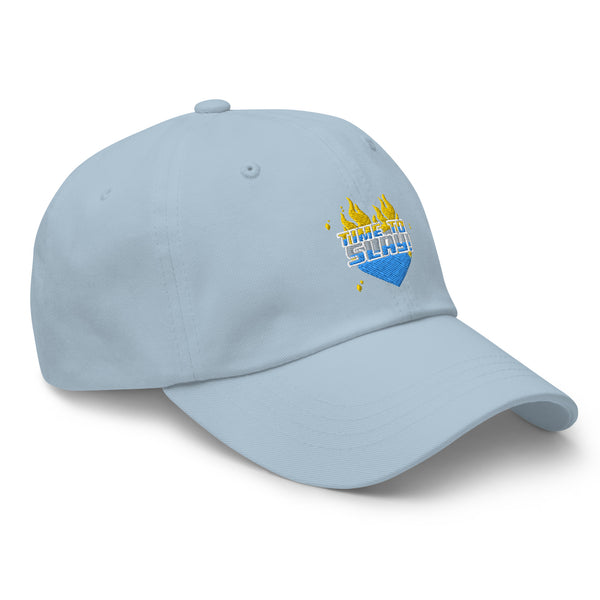 Light blue queer cap with an embroidered blue diamond, yellow flames, bold yellow 