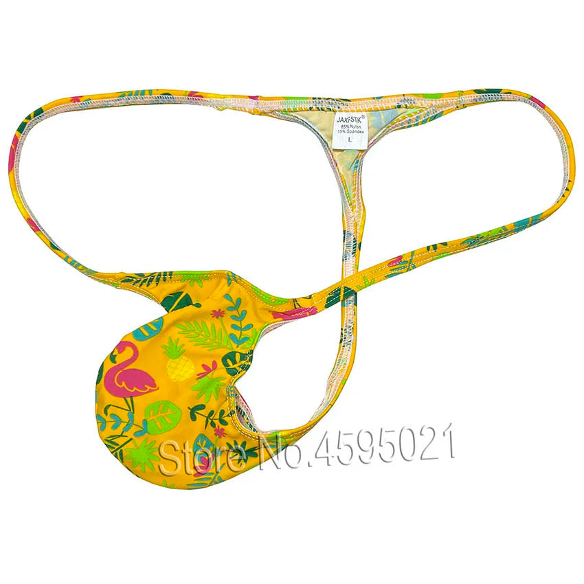 Bright yellow thong with thin straps and colorful tropical floral, pineapple, and flamingo print