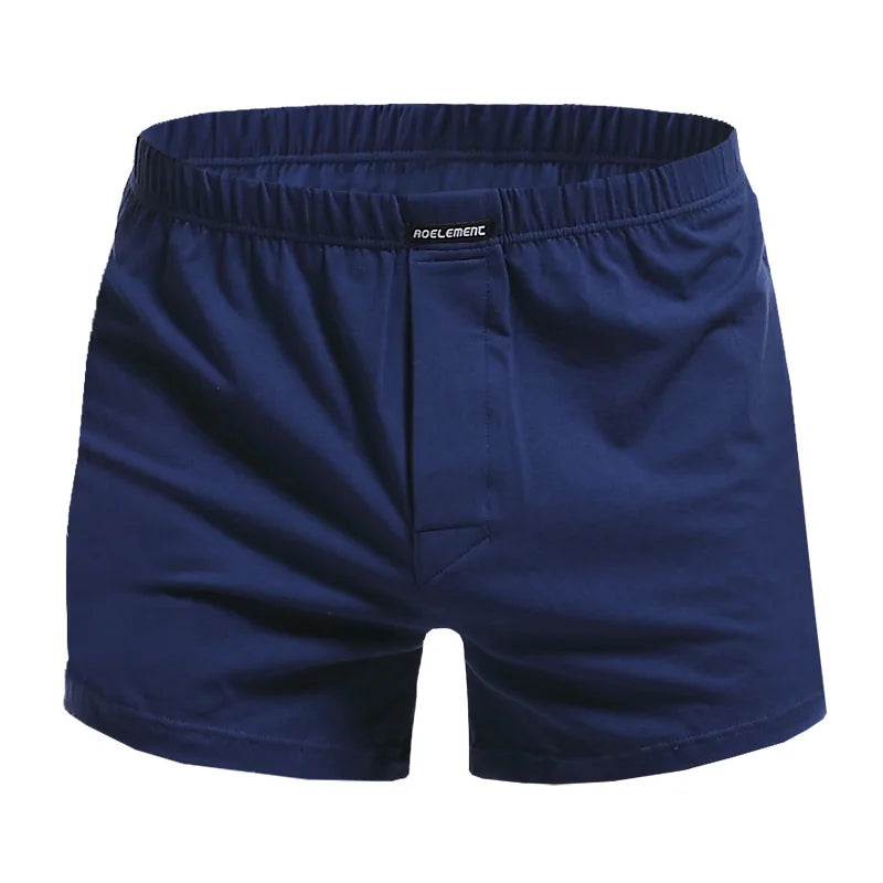 Front view of navy blue cotton boxer shorts with an elastic waistband and fly