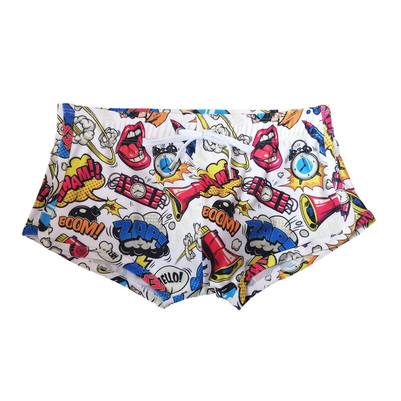 Front view of white comic-print swim shorts with drawstring and colorful BOOM and ZAP graphics