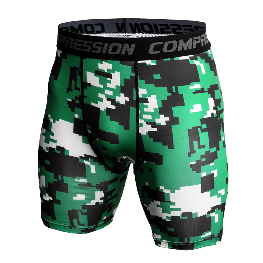 Green, black, and white pixelated camouflage compression shorts with a wide black waistband