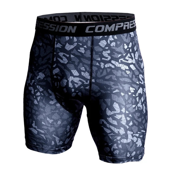 Front view of black and gray geometric camouflage compression shorts with branded elastic waistband