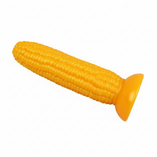 Orange corn-shaped dildo with textured kernels and a flared base on white