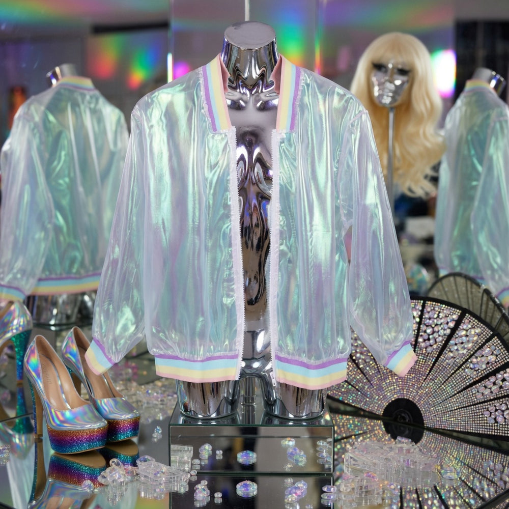 Front-facing mannequin wearing an iridescent translucent bomber jacket with pastel trim