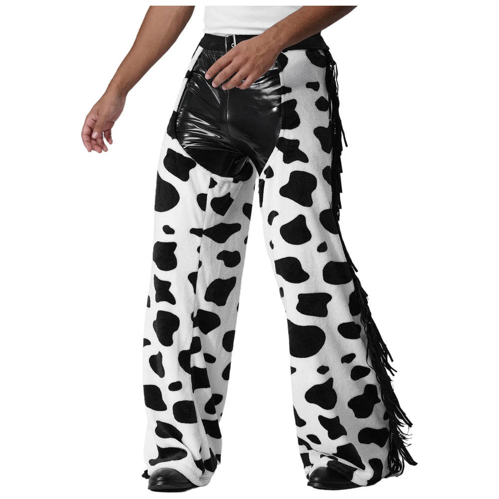 Front view of a model wearing black vinyl and cow-print chaps with side fringe
