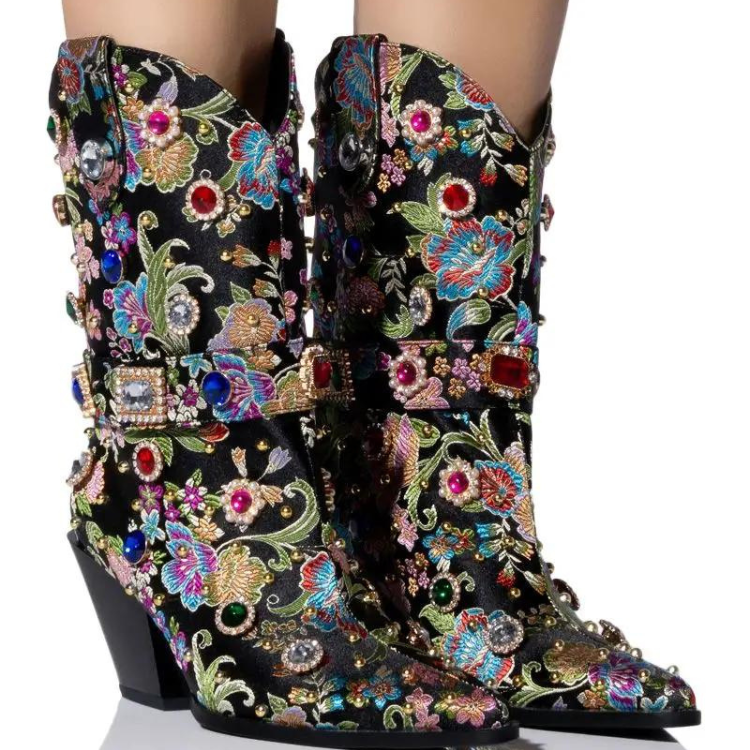 Pair of black mid-calf pointed-toe boots with colorful floral embroidery and jeweled studs