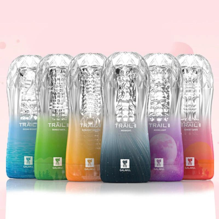 Six clear-sleeved Trail II masturbators in blue, green, orange, gray, purple, and pink