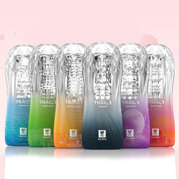 Six clear-sleeved Trail II masturbators in blue, green, orange, gray, purple, and pink