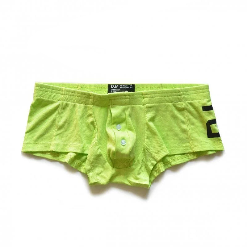 Front view of neon green button-fly boxer briefs laid flat on a white background